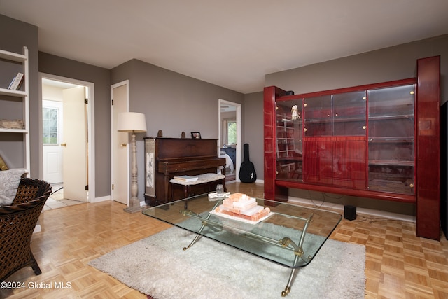 living room featuring light parquet flooring