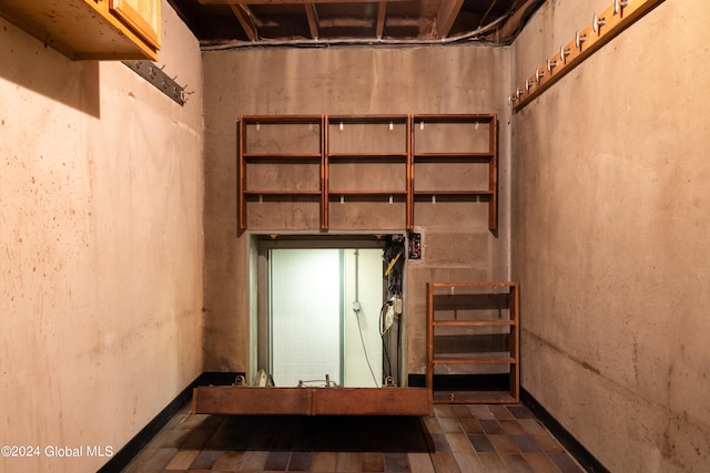 stairway with tile patterned flooring