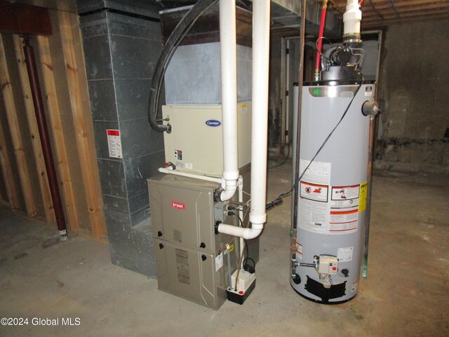 utility room with gas water heater