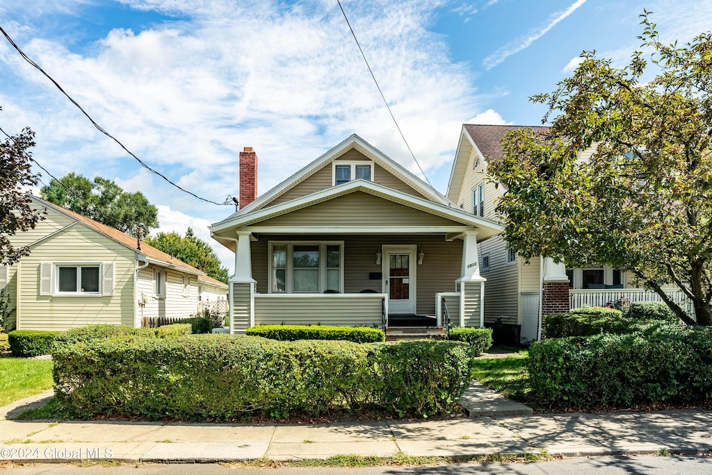 bungalow-style home featuring covered porch