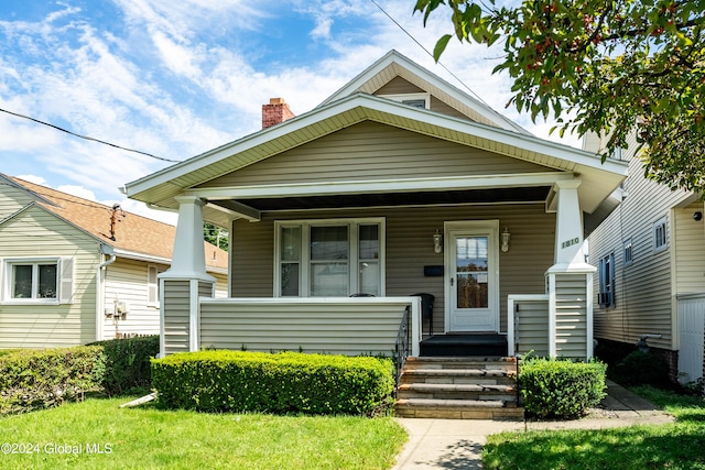 bungalow-style house with covered porch