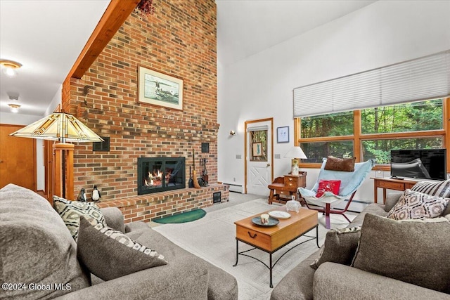 living room with a baseboard heating unit, high vaulted ceiling, and a brick fireplace