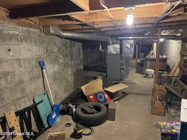 unfinished basement with heating unit