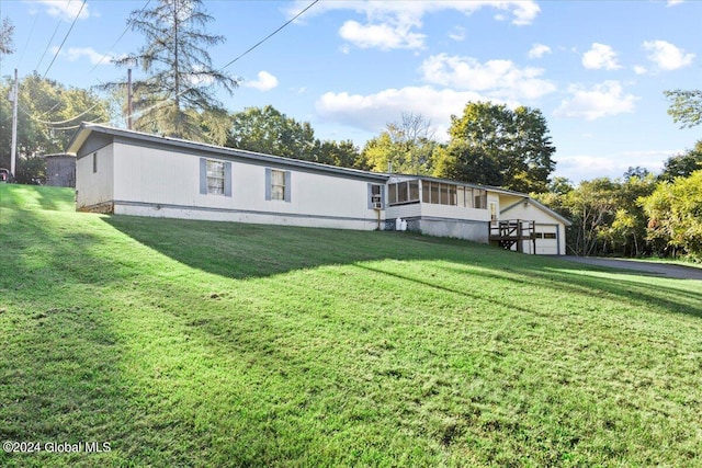 exterior space featuring a front lawn