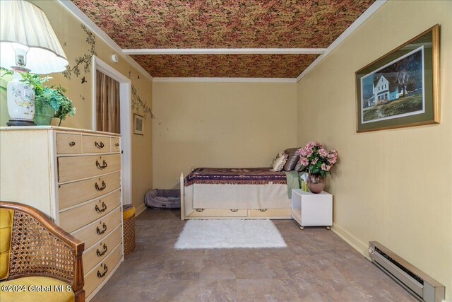 bedroom featuring crown molding and baseboard heating