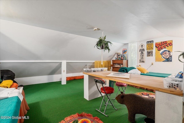 carpeted office space with lofted ceiling