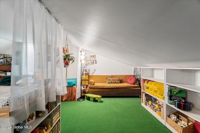 recreation room with lofted ceiling and carpet