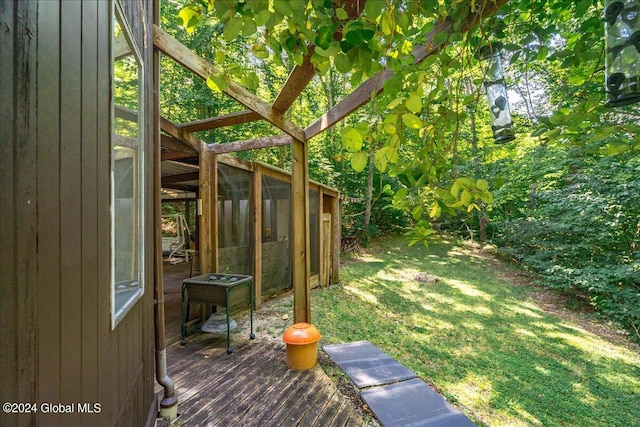 view of yard with a wooden deck