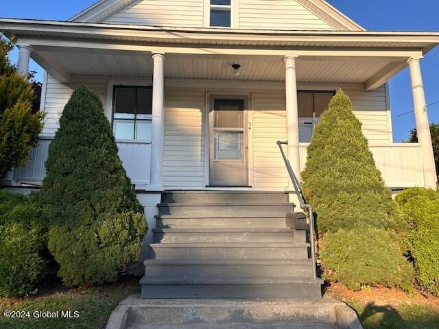 entrance to property with a porch