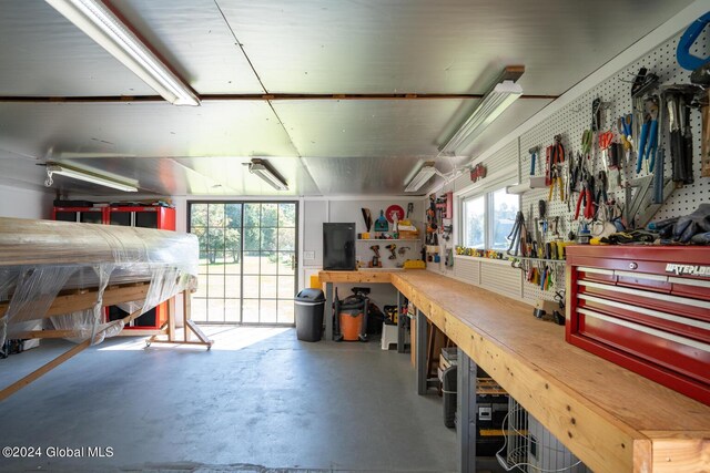 garage with a workshop area