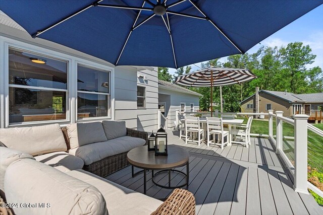 deck with an outdoor hangout area