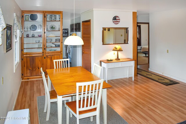 dining room with light hardwood / wood-style flooring