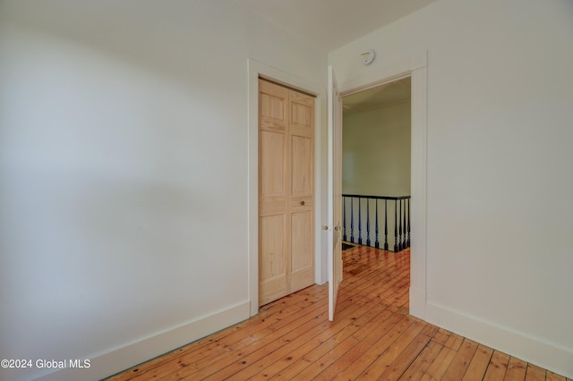 unfurnished room featuring light wood-type flooring