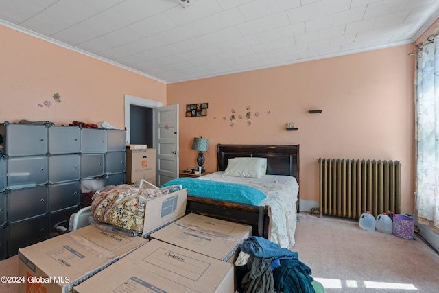 bedroom featuring carpet, radiator heating unit, and ornamental molding