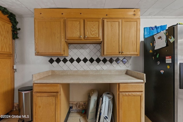 kitchen featuring stainless steel refrigerator