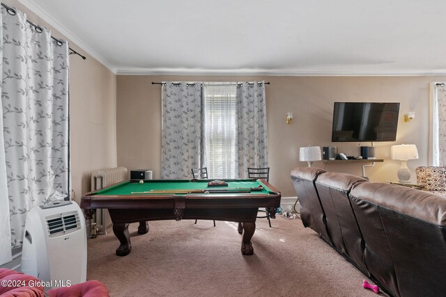 recreation room with ornamental molding, billiards, radiator heating unit, and carpet