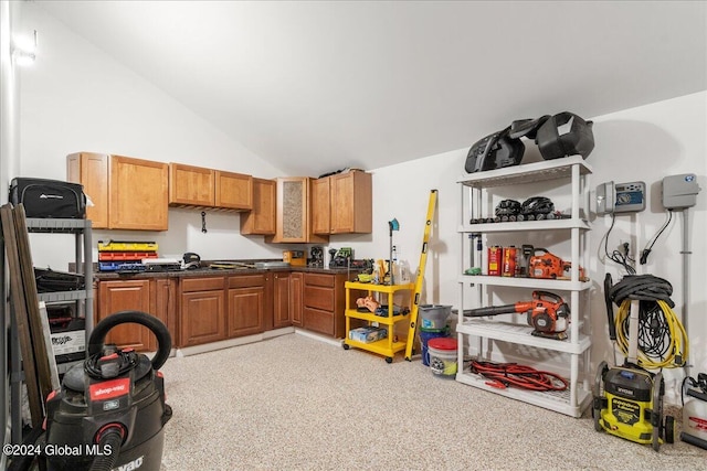 kitchen with lofted ceiling