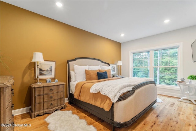 bedroom featuring light hardwood / wood-style floors