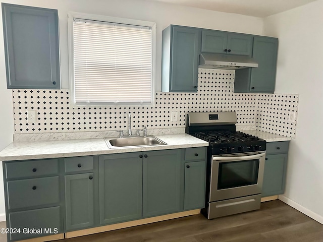 kitchen featuring decorative backsplash, dark hardwood / wood-style flooring, sink, and stainless steel gas range