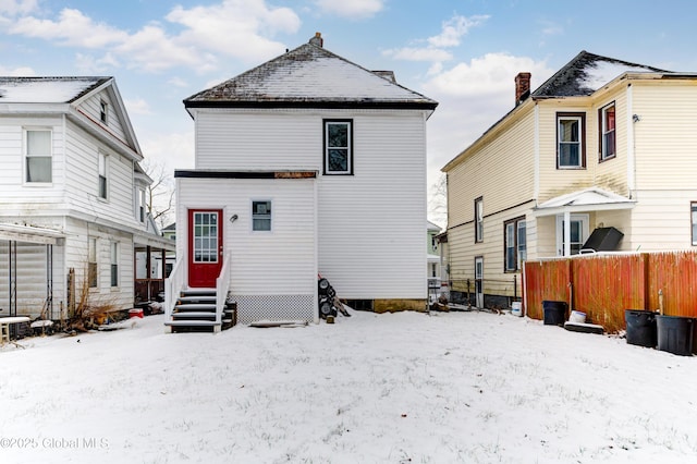 view of snow covered house