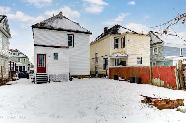 view of snow covered property