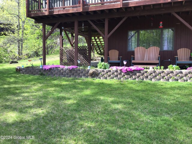 view of yard featuring a deck