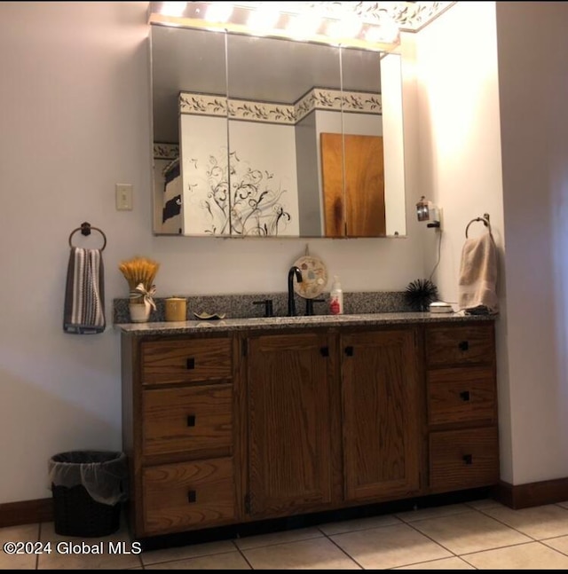 bathroom with vanity and tile patterned floors