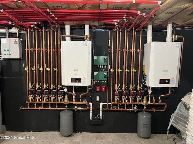 utility room featuring tankless water heater