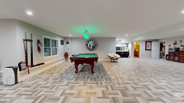 playroom with light parquet floors and pool table