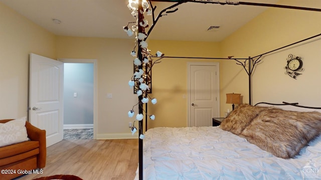 bedroom featuring hardwood / wood-style floors