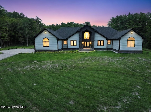 view of front of house with a lawn