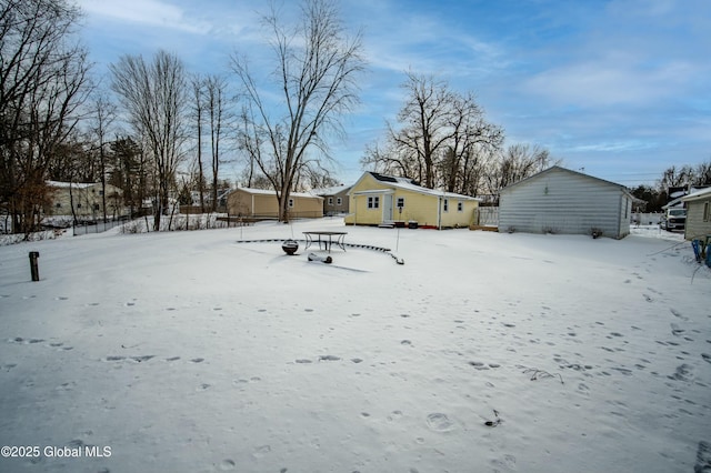 view of yard covered in snow