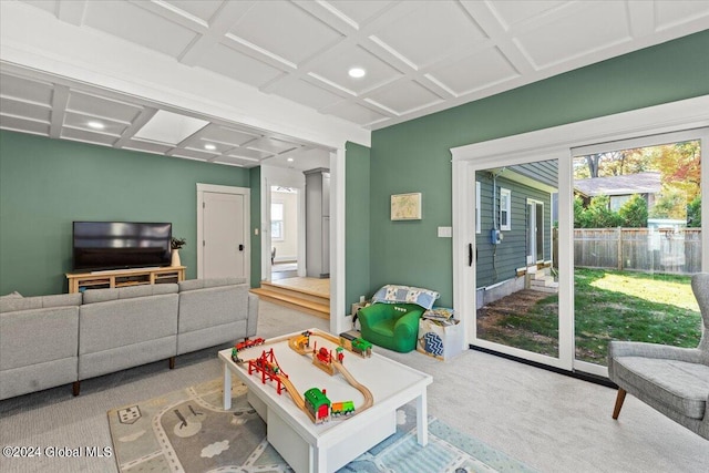 recreation room featuring light carpet and coffered ceiling