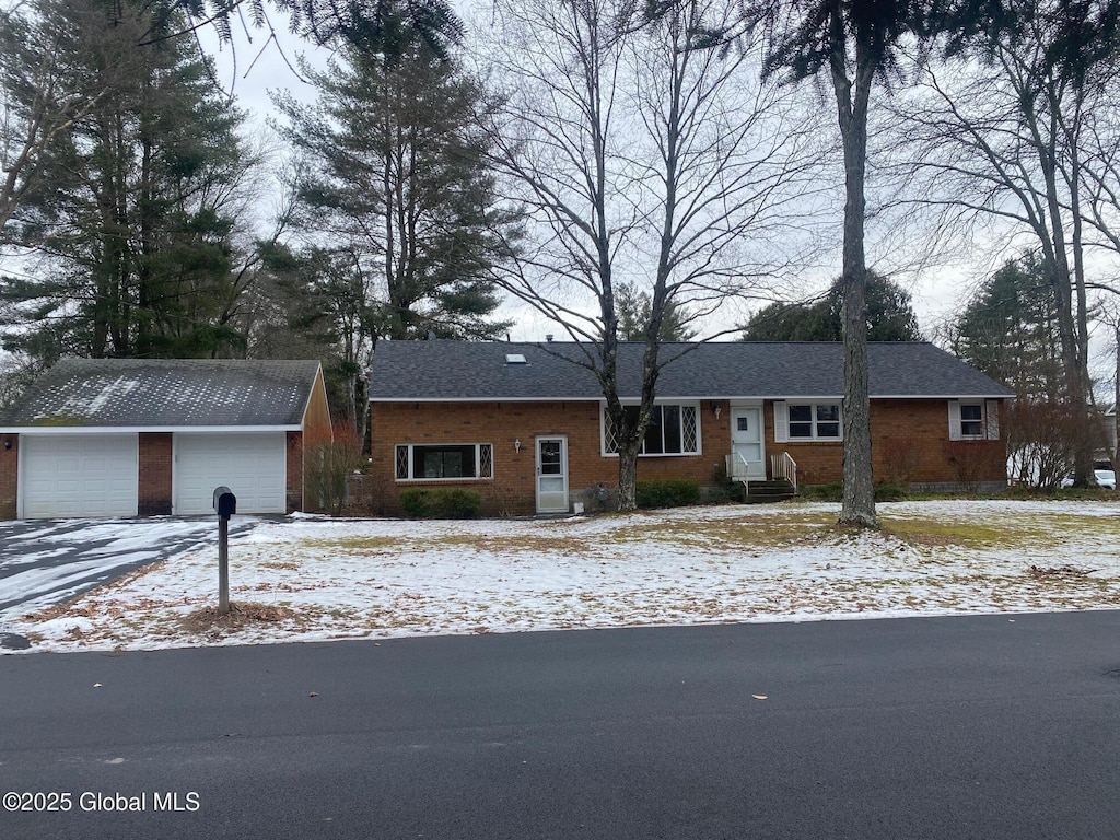 ranch-style home with a garage