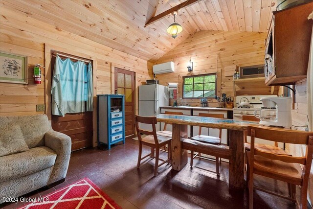 kitchen with lofted ceiling with beams, a wall unit AC, wooden walls, and white appliances