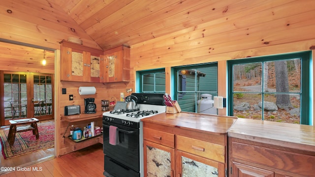 kitchen featuring wooden ceiling, light hardwood / wood-style floors, white range with gas cooktop, wooden counters, and vaulted ceiling