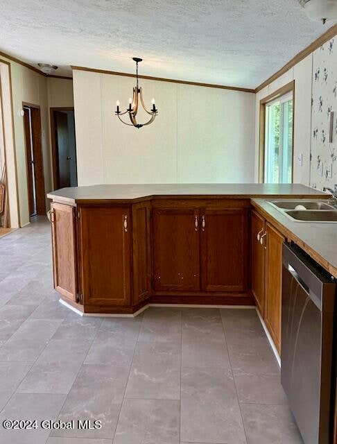 kitchen with a textured ceiling, an inviting chandelier, dishwasher, pendant lighting, and crown molding