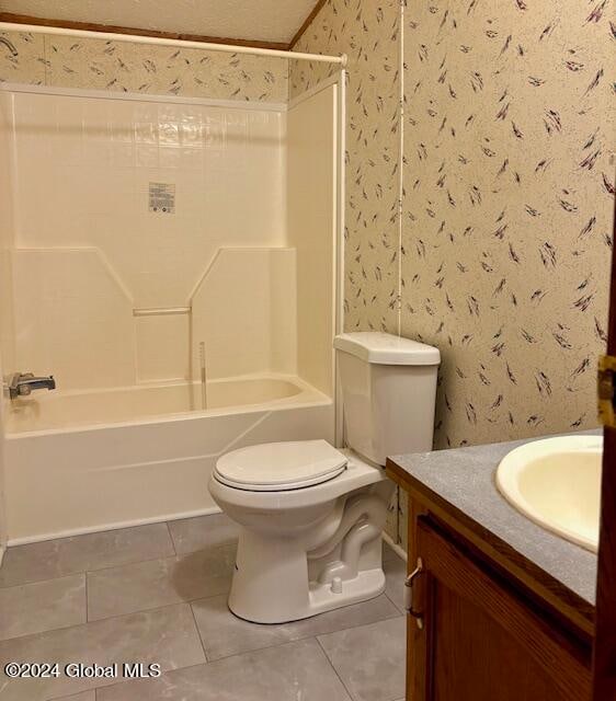 full bathroom with tile patterned flooring, vanity, toilet, and shower / bath combination