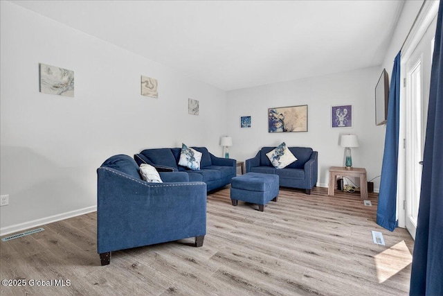 50 Whipple Way, Altamont, NY 12009 - living area featuring wood finished floors and baseboards