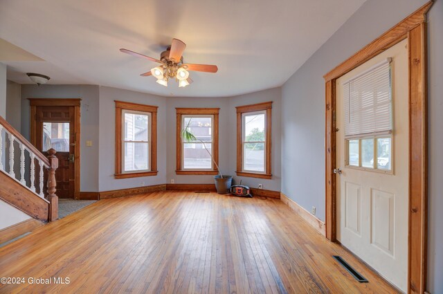 foyer featuring light wood-type flooring and ceiling fan