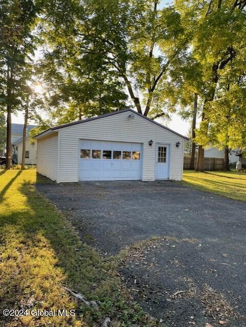 garage with a yard