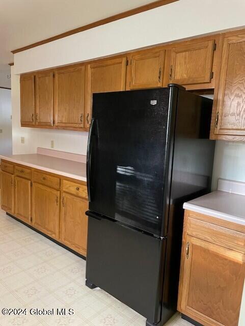 kitchen with black fridge