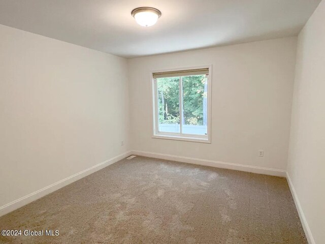 empty room with carpet floors