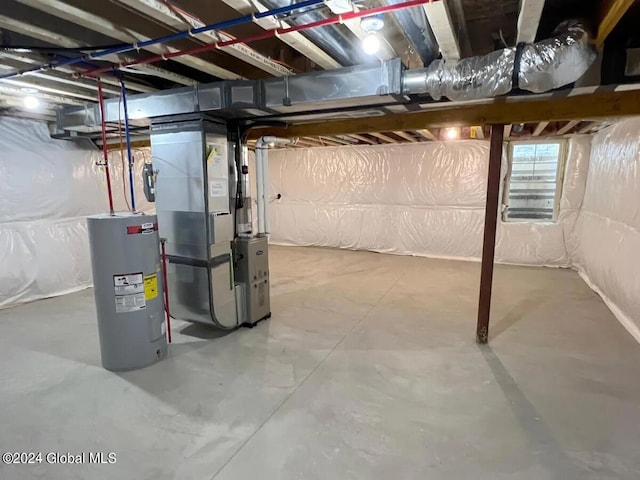 basement with electric water heater and heating unit