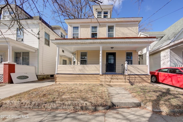 traditional style home with covered porch