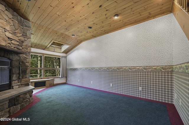 135 Sparrowhawk Lake Rd, Maryland, NY 12155 - carpeted living area featuring lofted ceiling, wooden ceiling, wallpapered walls, a wainscoted wall, and a fireplace