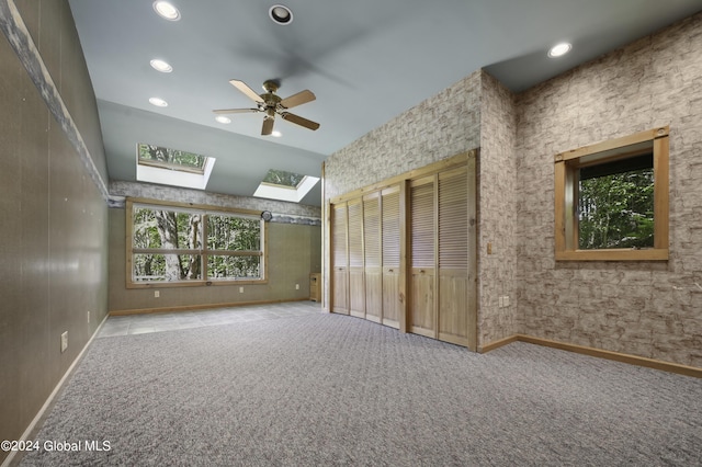 135 Sparrowhawk Lake Rd, Maryland, NY 12155 - unfurnished bedroom featuring carpet flooring, a skylight, baseboards, recessed lighting, and a ceiling fan