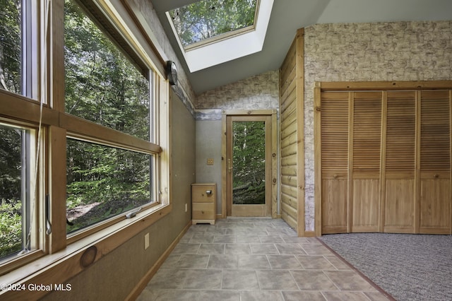 135 Sparrowhawk Lake Rd, Maryland, NY 12155 - interior space featuring lofted ceiling with skylight