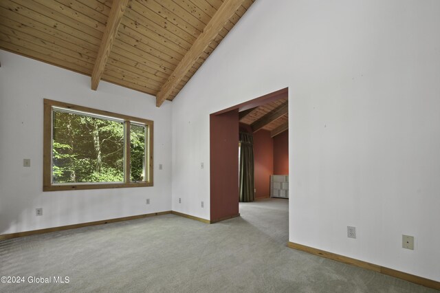 135 Sparrowhawk Lake Rd, Maryland, NY 12155 - unfurnished room featuring carpet flooring, high vaulted ceiling, beamed ceiling, baseboards, and wood ceiling