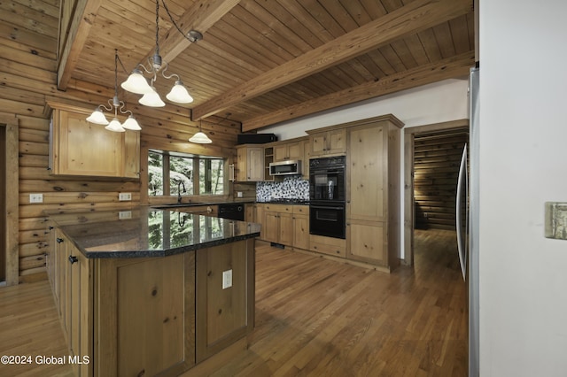 135 Sparrowhawk Lake Rd, Maryland, NY 12155 - kitchen with a sink, black appliances, light wood-style floors, and a notable chandelier
